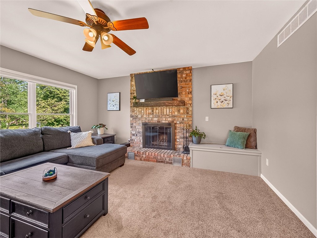 233 Dean Road Parma, NY 14559 - Photo 13 of 42 Wood burning fireplace in the living room and buil