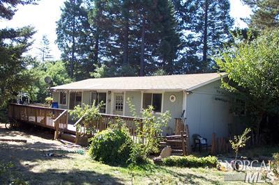 18050 Blattner Road Philo, CA 95466 - Photo 1 of 3 a front view of a house with garden