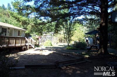 18050 Blattner Road Philo, CA 95466 - Photo 3 of 3 a view of a yard with car parked