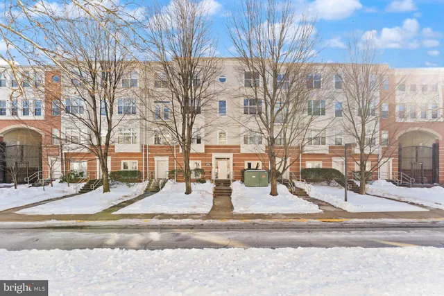a view of city with tall buildings