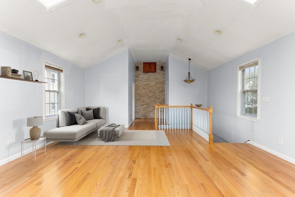 28 Stebbins Street Worcester, MA 01607 - Photo 16 of 29 a bedroom with a bed and a large window