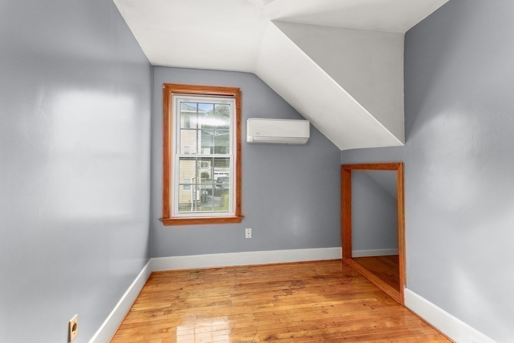 28 Stebbins Street Worcester, MA 01607 - Photo 18 of 29 a view of an empty room and window