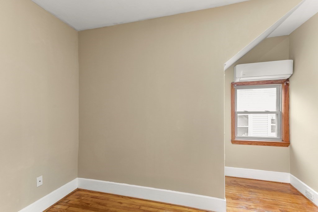28 Stebbins Street Worcester, MA 01607 - Photo 22 of 29 a view of an empty room and window