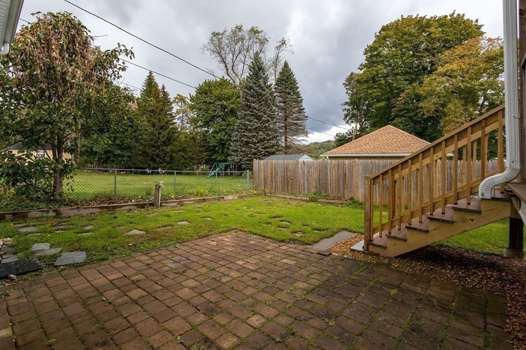 28 Stebbins Street Worcester, MA 01607 - Photo 29 of 29 a view of a house with backyard and sitting area