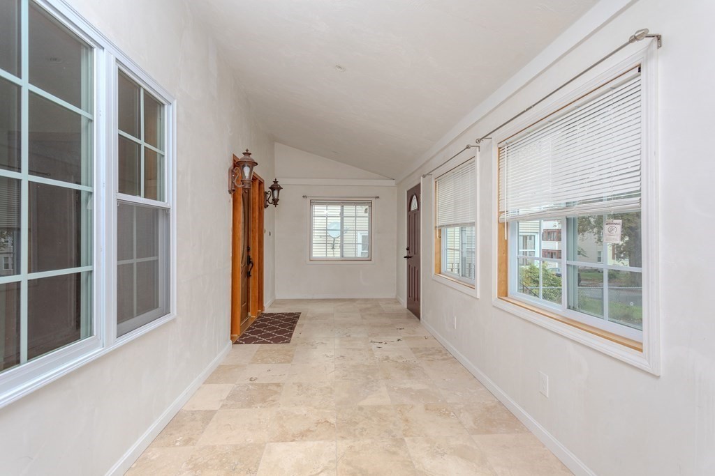 28 Stebbins Street Worcester, MA 01607 - Photo 7 of 29 a view of an empty room with a window