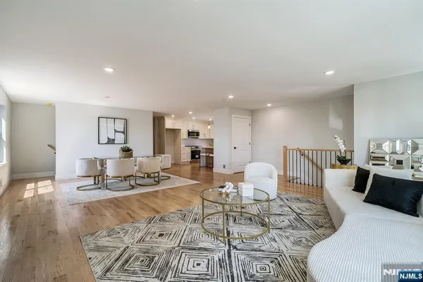 a kitchen with kitchen island a cabinets counter space and appliances