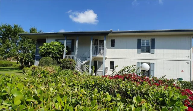 front view of a house with a big yard