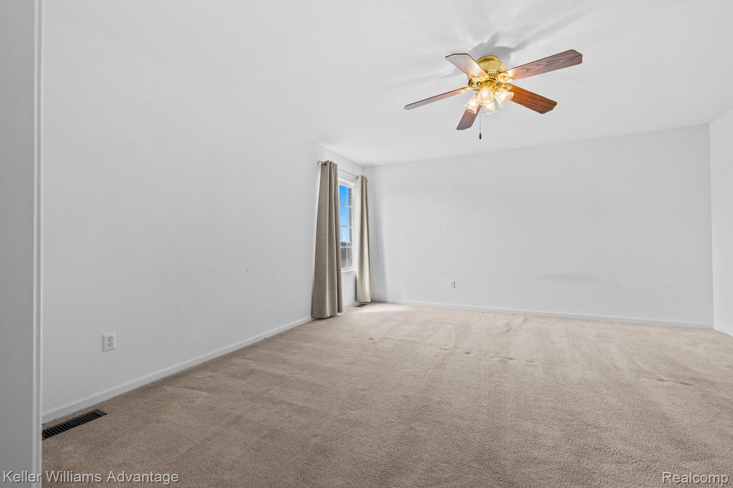 4100 Norwich Court Rochester, MI 48306 - Photo 49 of 72 Unfurnished room with ceiling fan and light carpet