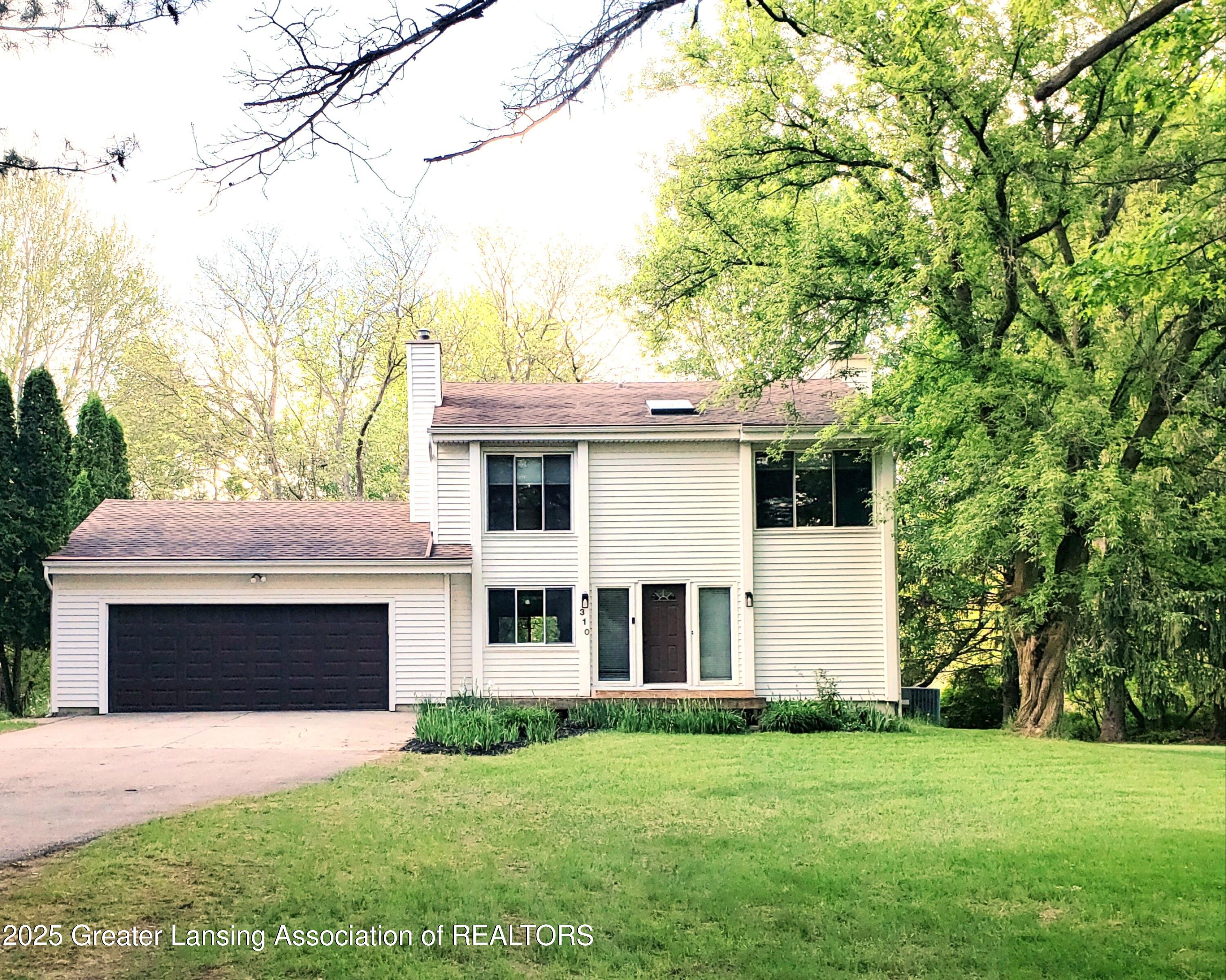 310 Piper Road Haslett, MI 48840 - Photo 1 of 45 Front Piper