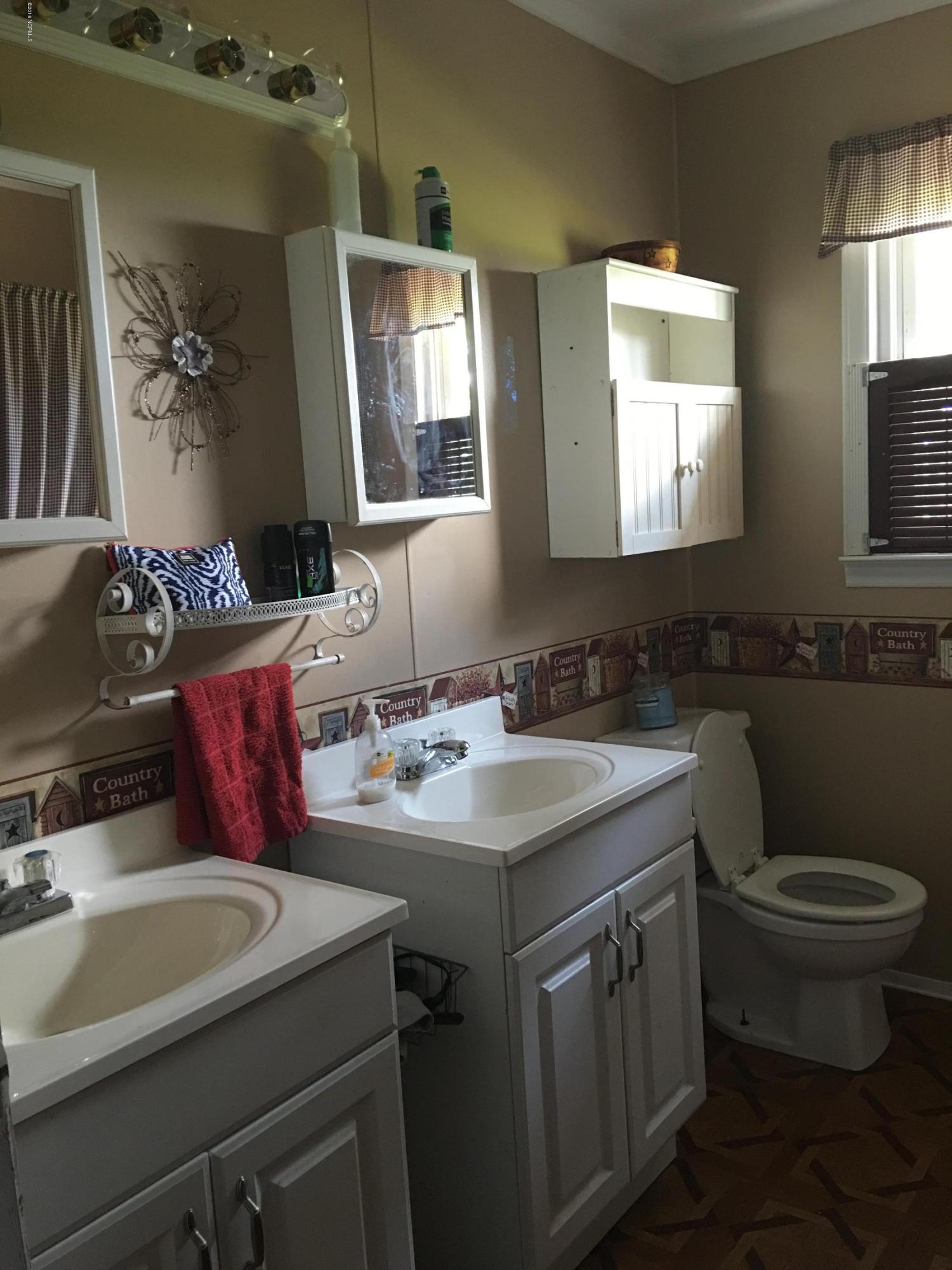2165 Quarter Road Swanquarter, NC 27885 - Photo 4 of 16 Roomy bathroom with separate his and her sinks.