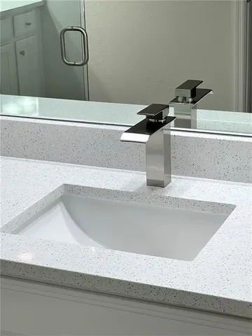 a view of a workspace with a table and chairs in patio