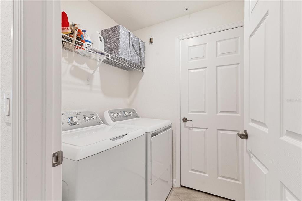 18113 Gawthrop Drive, Unit 101 Lakewood Ranch, FL 34211 - Photo 27 of 73 a utility room with dryer and washer