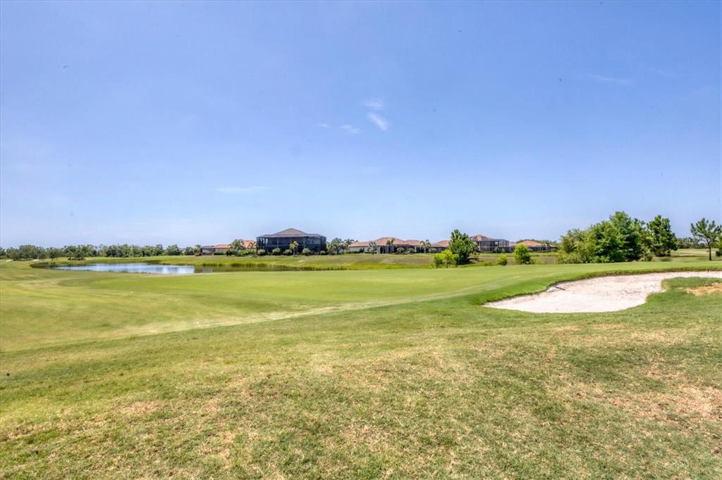 18113 Gawthrop Drive, Unit 101 Lakewood Ranch, FL 34211 - Photo 35 of 73 a view of an ocean and beach