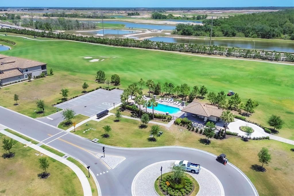 18113 Gawthrop Drive, Unit 101 Lakewood Ranch, FL 34211 - Photo 37 of 73 an aerial view of a house with a lake view