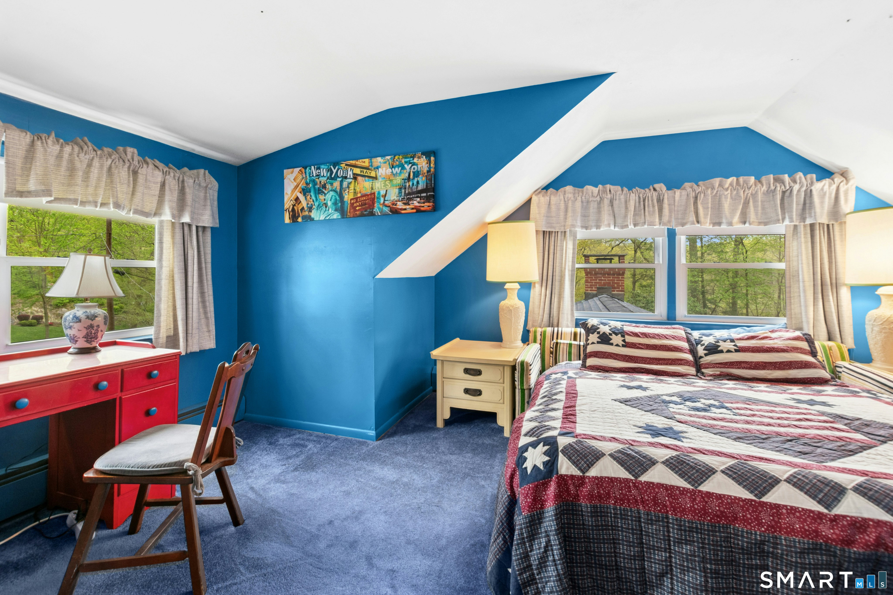 15 Limestone Terrace Ridgefield, CT 06877 - Photo 15 of 32 a bedroom with a bed and a window