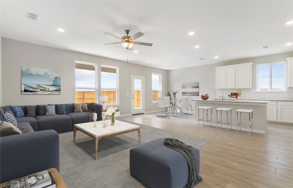 1604 Tyler Drive Anna, TX 75409 - Photo 2 of 5 a living room with furniture and kitchen view