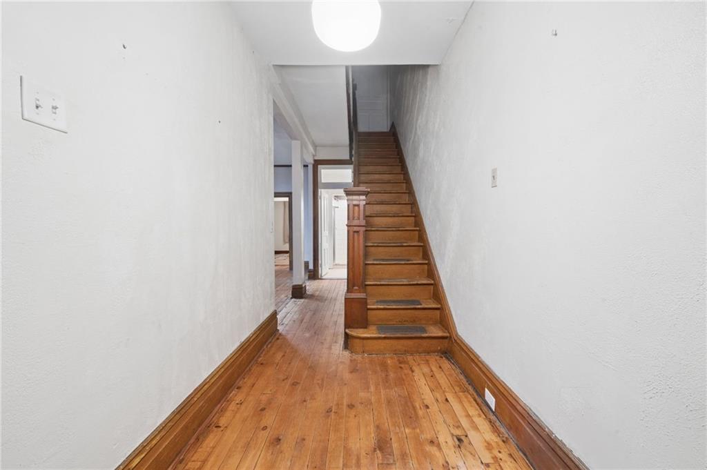 1523 Evergreen Road Pittsburgh, PA 15209 - Photo 3 of 35 a view of a hallway with wooden floor and entryway