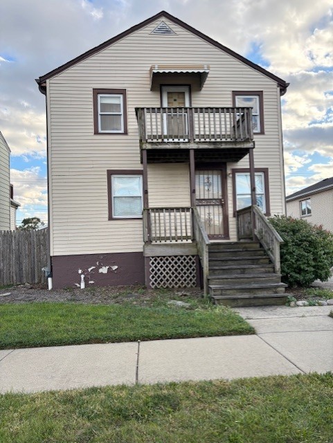 7113 West 71st Street Chicago, IL 60638 - Photo 2 of 16 a front view of a house with a garden