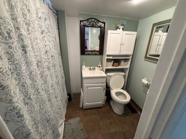 7113 West 71st Street Chicago, IL 60638 - Photo 8 of 16 a bathroom with a toilet sink and mirror