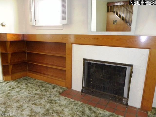 4018 Rosemond Road Cleveland Heights, OH 44121 - Photo 9 of 25 Living room's wood burning fireplace.