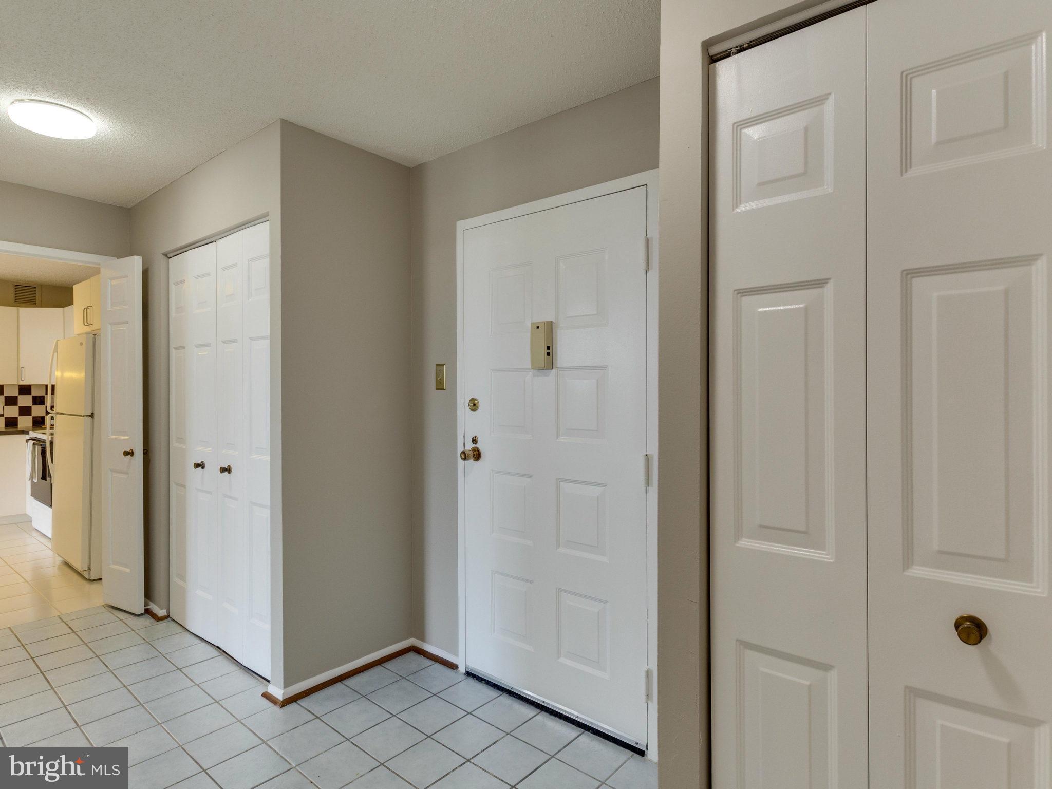 6800 Fleetwood Road, Unit 711 McLean, VA 22101 - Photo 2 of 27 a view of a hallway with closet area