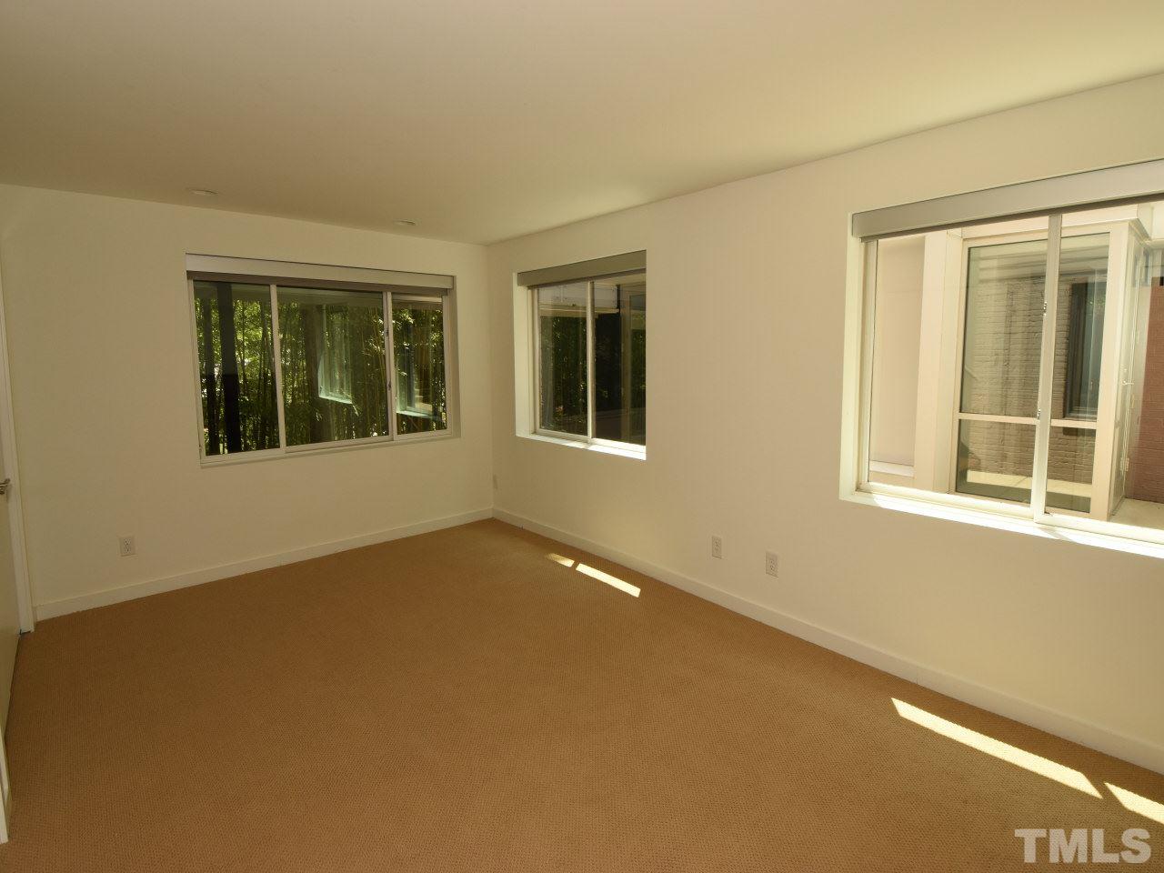 2109 St James Road Raleigh, NC 27607 - Photo 21 of 25 a view of an empty room with a window