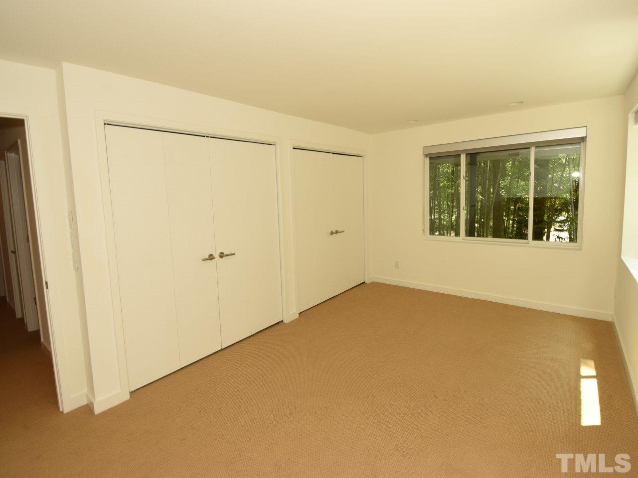 2109 St James Road Raleigh, NC 27607 - Photo 22 of 25 a view of an empty room with a window
