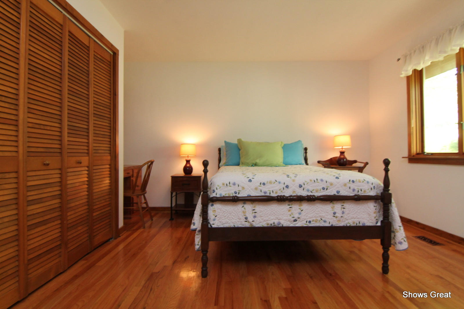 5462 Lakedale Road Southwest Roanoke, VA 24018 - Photo 13 of 45 a bedroom with a bed and wooden floor