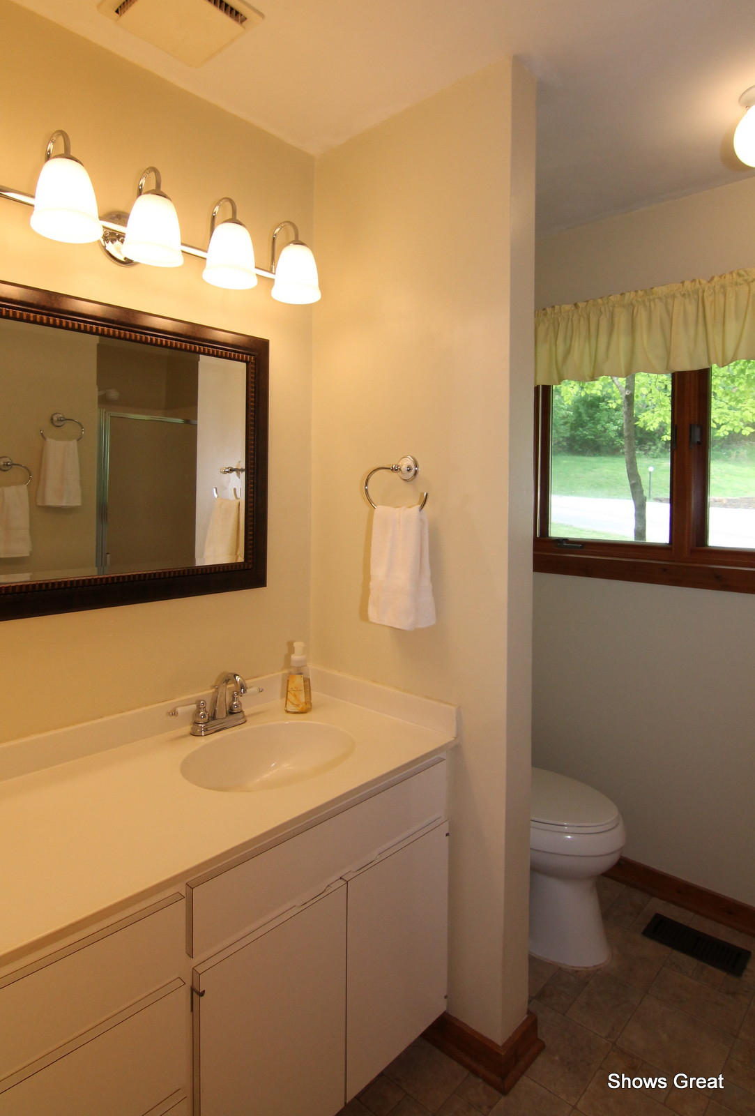 5462 Lakedale Road Southwest Roanoke, VA 24018 - Photo 15 of 45 a bathroom with a sink and a mirror