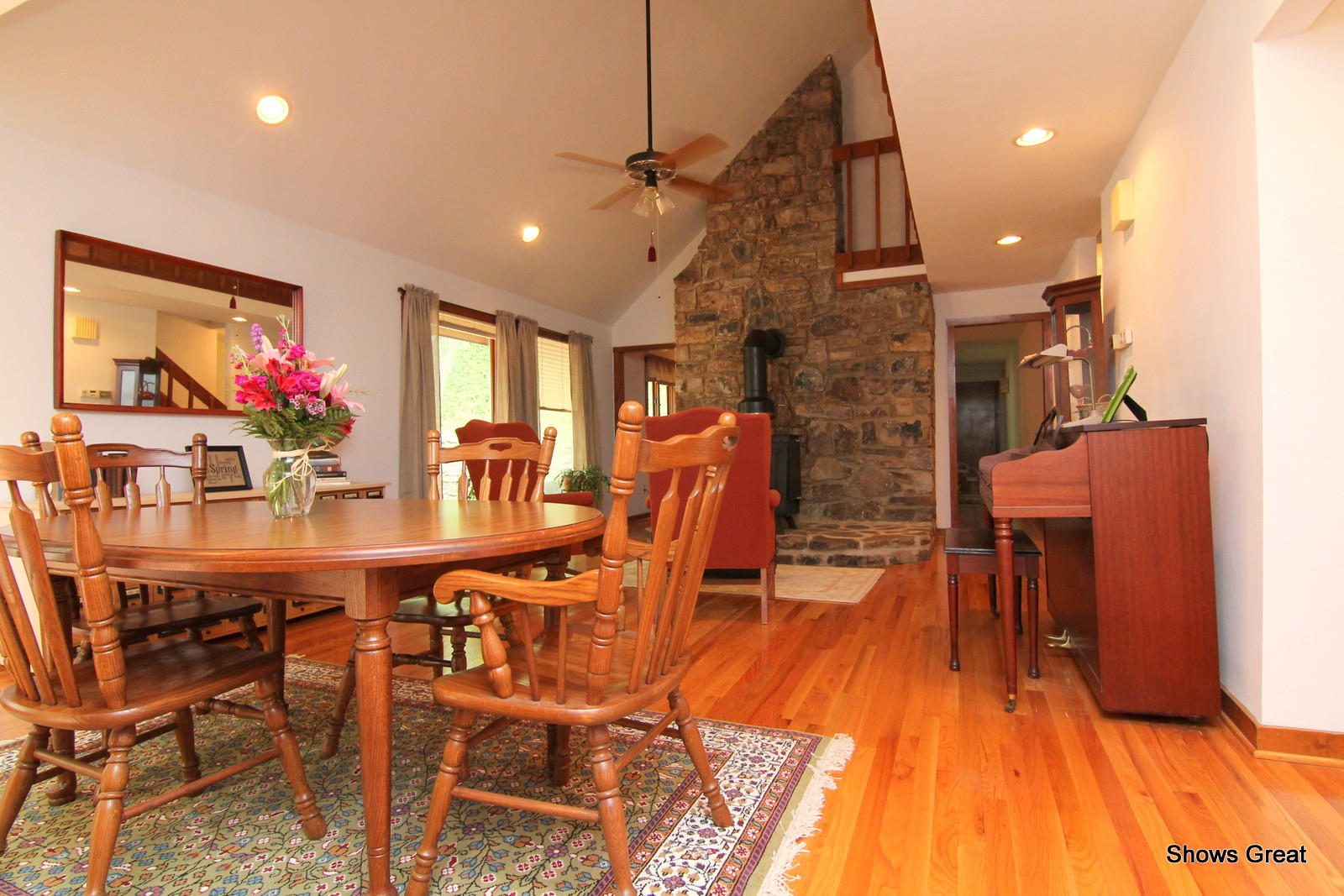 5462 Lakedale Road Southwest Roanoke, VA 24018 - Photo 3 of 45 a view of a dining room with furniture a chandelier and wooden floor