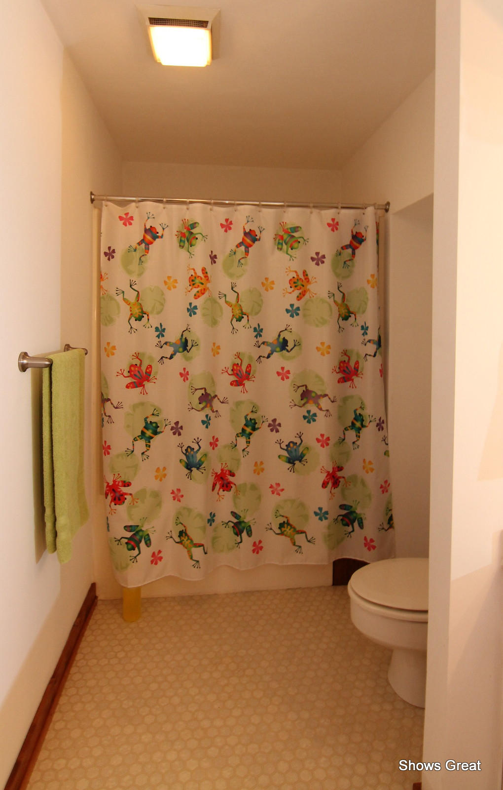5462 Lakedale Road Southwest Roanoke, VA 24018 - Photo 27 of 45 a bathroom with a toilet and a shower curtain