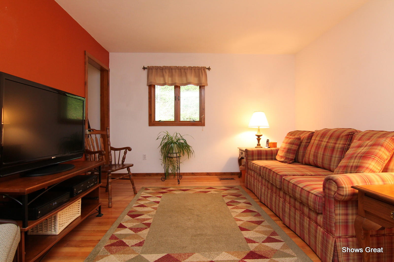 5462 Lakedale Road Southwest Roanoke, VA 24018 - Photo 8 of 45 a living room with a couch and a flat screen tv