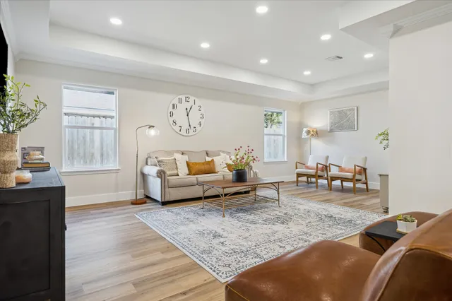 a living room with furniture and a couch