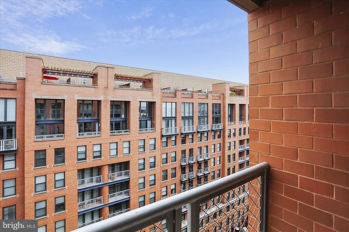 616 E Street Northwest, Unit 1207 Washington, DC 20004 - Photo 14 of 25 a view of a building from a balcony