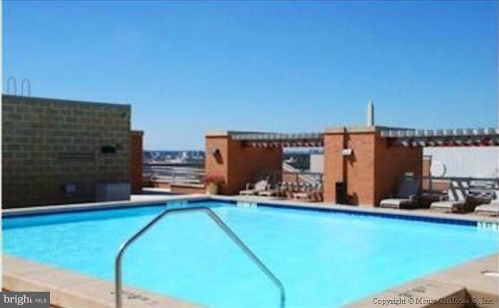 616 E Street Northwest, Unit 1207 Washington, DC 20004 - Photo 19 of 25 a view of a balcony with chairs