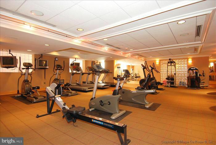 616 E Street Northwest, Unit 1207 Washington, DC 20004 - Photo 25 of 25 a view of a room with gym equipment