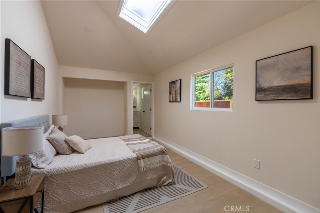 911 West George Street Banning, CA 92220 - Photo 18 of 32 a bedroom with a bed and a window