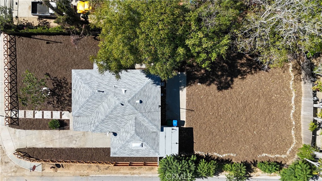 911 West George Street Banning, CA 92220 - Photo 2 of 32 an aerial view of a house with a yard