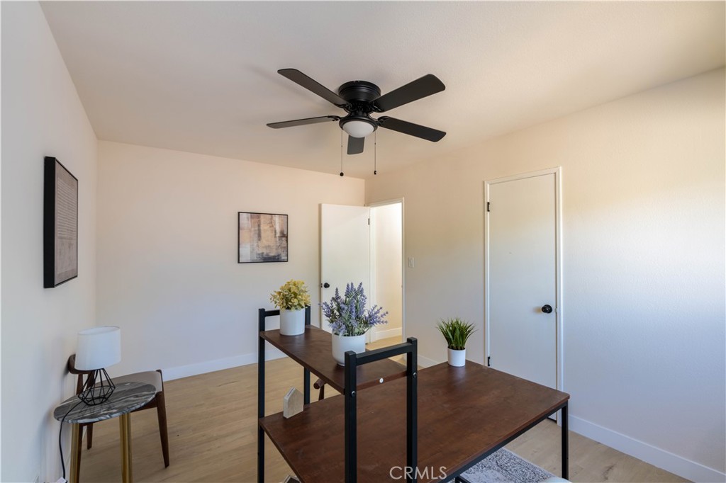 911 West George Street Banning, CA 92220 - Photo 27 of 32 a dining room with furniture and window