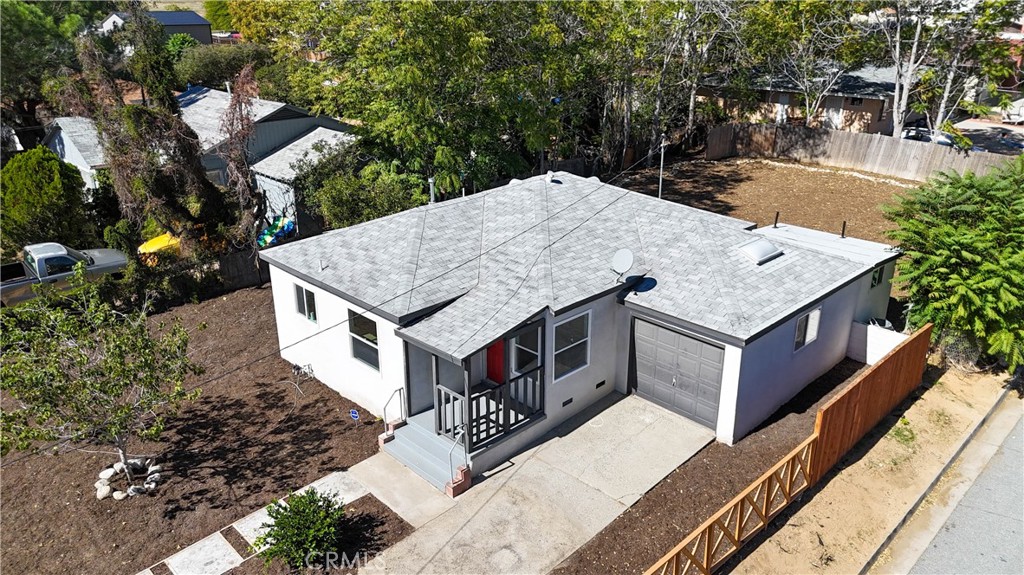 911 West George Street Banning, CA 92220 - Photo 29 of 32 an aerial view of a house with a yard