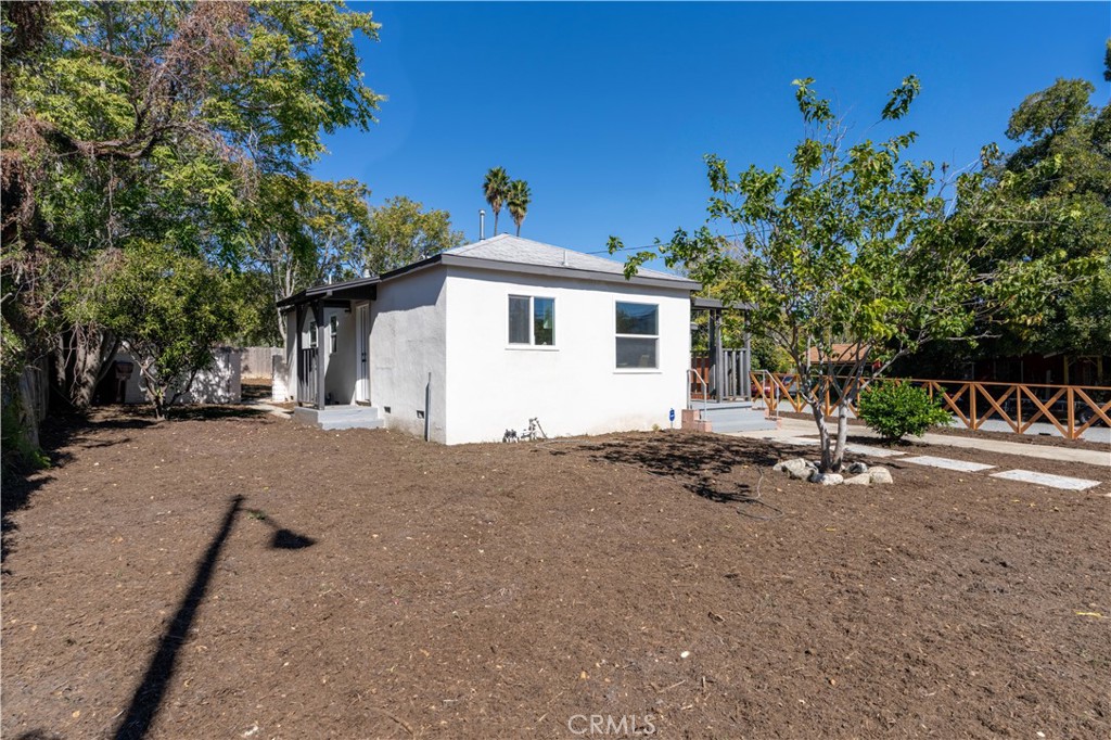 911 West George Street Banning, CA 92220 - Photo 31 of 32 a view of a house with a outdoor space