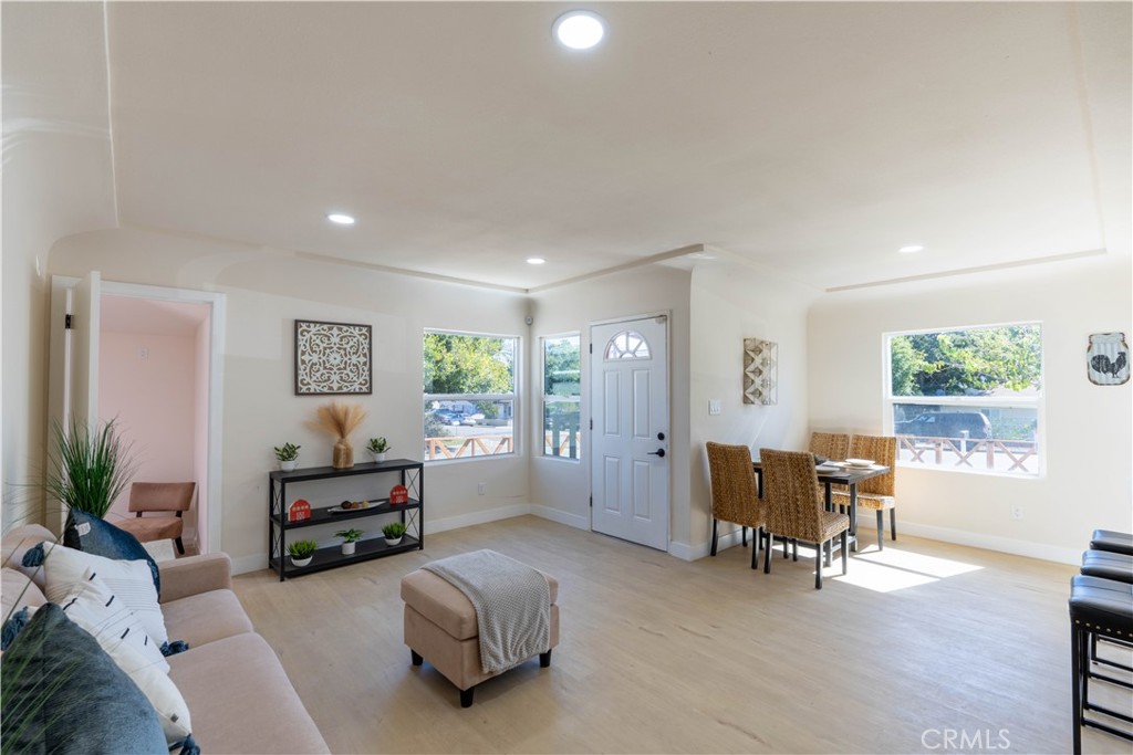 911 West George Street Banning, CA 92220 - Photo 10 of 32 a living room with furniture and a large window