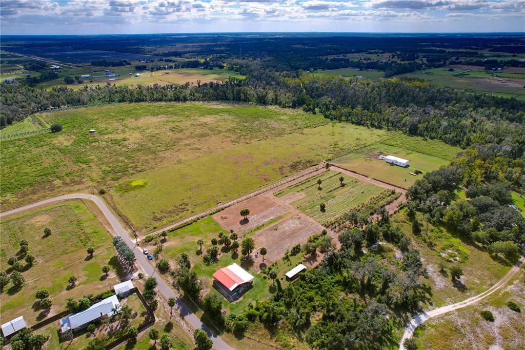 8994 Bunker Hill Road Parrish, FL 34219 - Photo 5 of 7 a view of a yard with an outdoor space