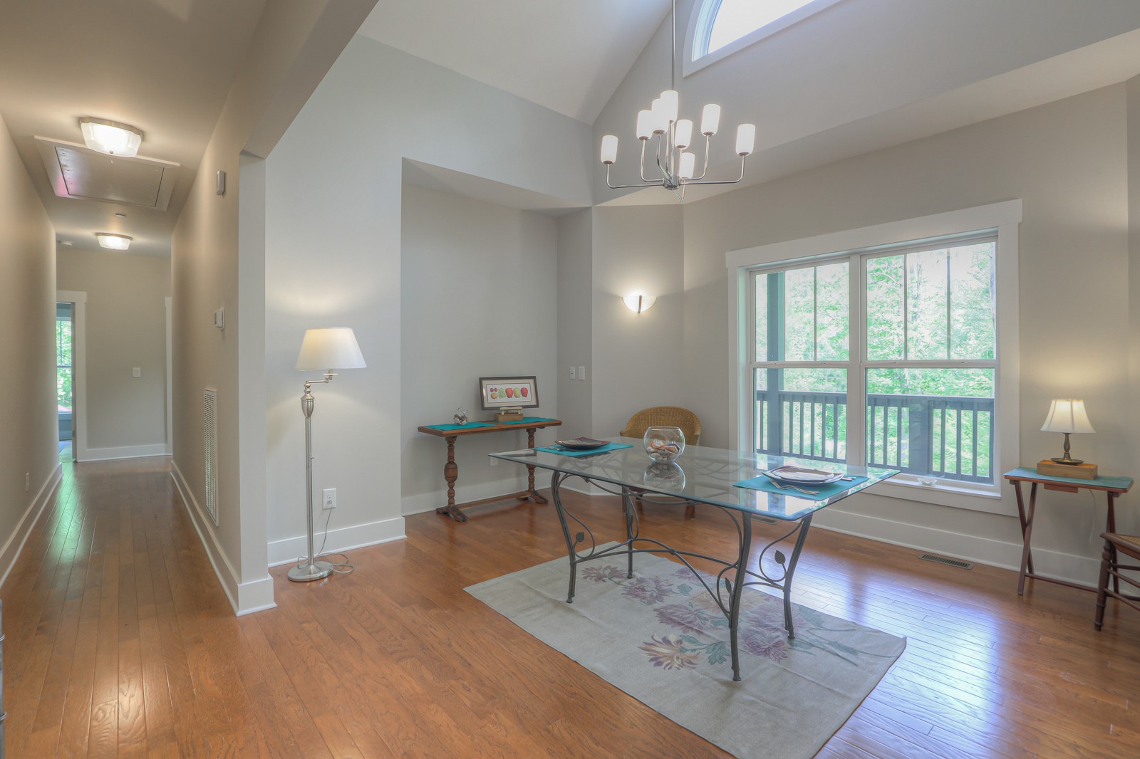 1115 Ridgecrest Road Kingston Springs, TN 37082 - Photo 13 of 38 a living room with furniture and a chandelier