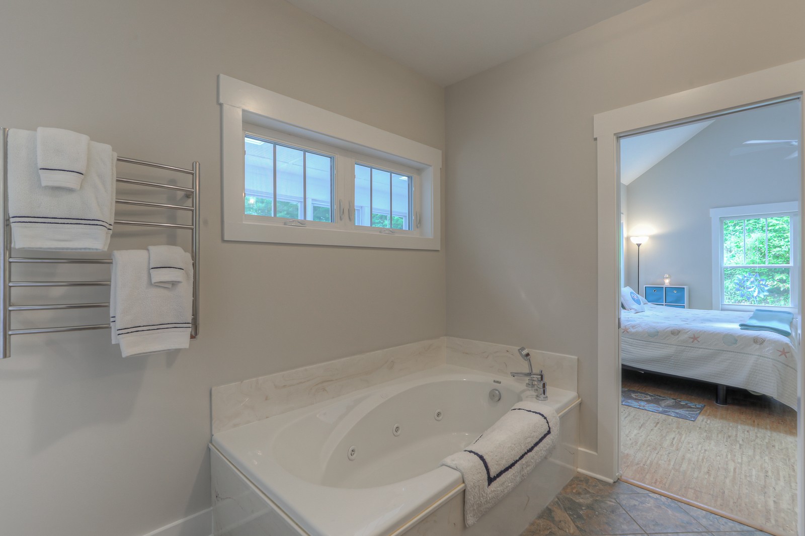 1115 Ridgecrest Road Kingston Springs, TN 37082 - Photo 16 of 38 a en suite bathroom with a bathtub and window