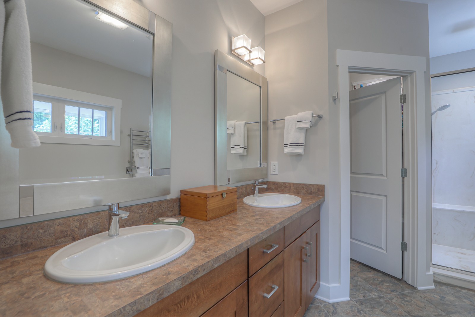 1115 Ridgecrest Road Kingston Springs, TN 37082 - Photo 18 of 38 a bathroom with a granite countertop sink and a mirror