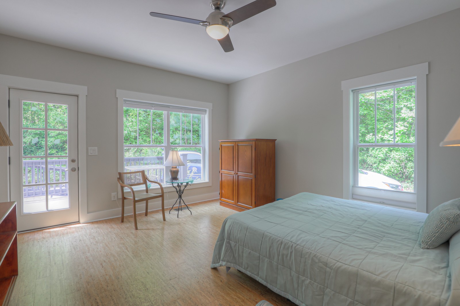 1115 Ridgecrest Road Kingston Springs, TN 37082 - Photo 22 of 38 a bedroom with a large bed and wooden floor