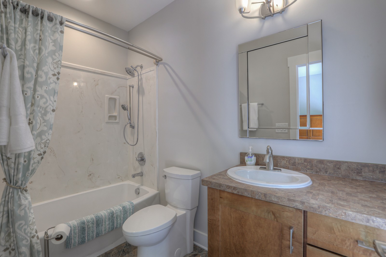 1115 Ridgecrest Road Kingston Springs, TN 37082 - Photo 23 of 38 a bathroom with a sink toilet tub and shower