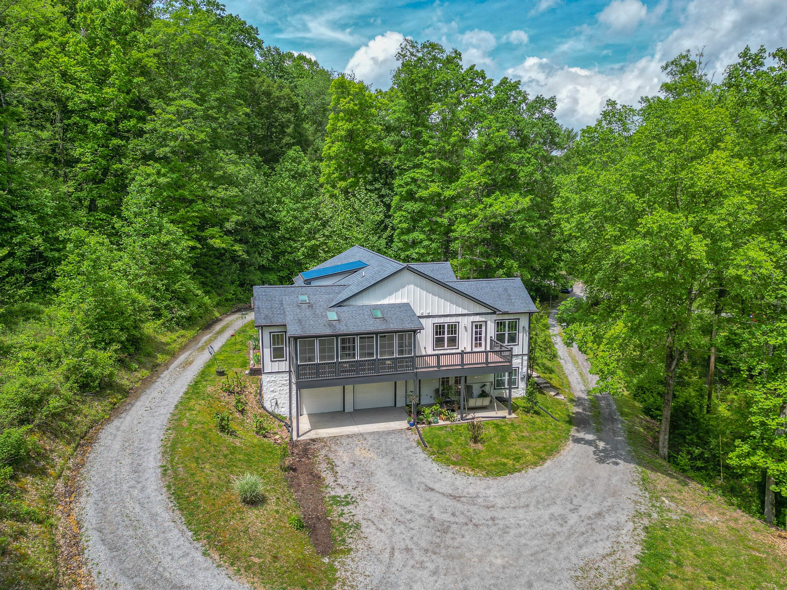 1115 Ridgecrest Road Kingston Springs, TN 37082 - Photo 31 of 38 a aerial view of a house with a yard and large trees