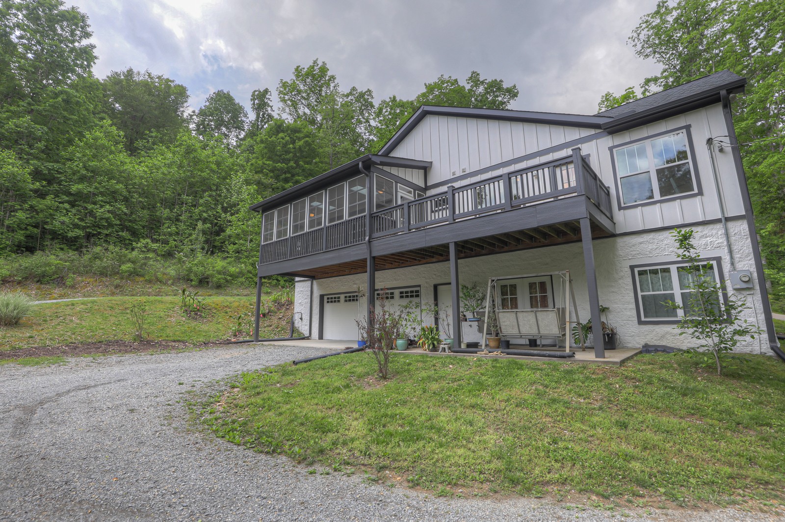 1115 Ridgecrest Road Kingston Springs, TN 37082 - Photo 5 of 38 a view of a house with a yard and sitting area